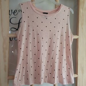 tank with metal dot accents